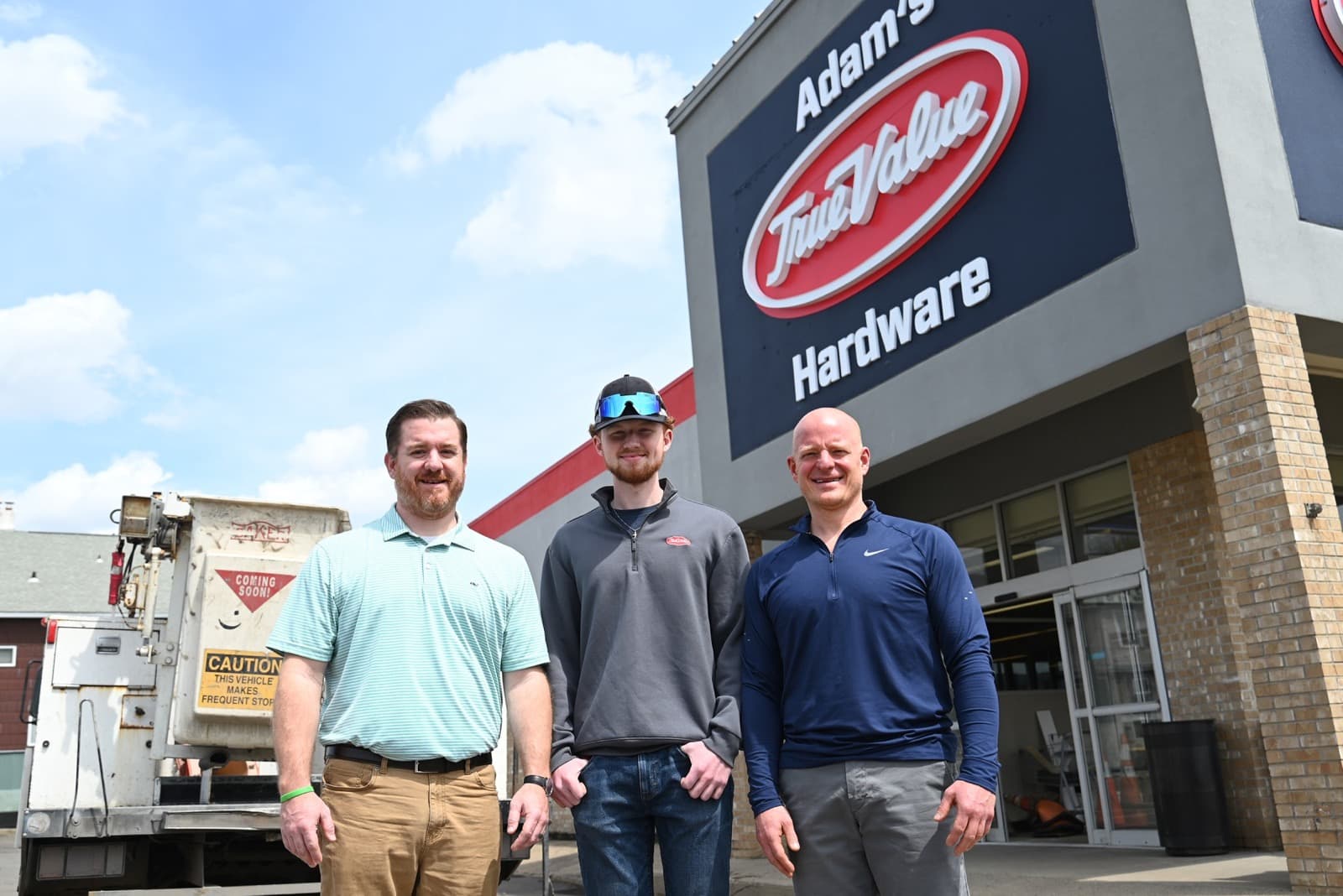 Chris and Justin Taffera with nephew Adam outside Adam's True Value on N. Main Ave, Scranton